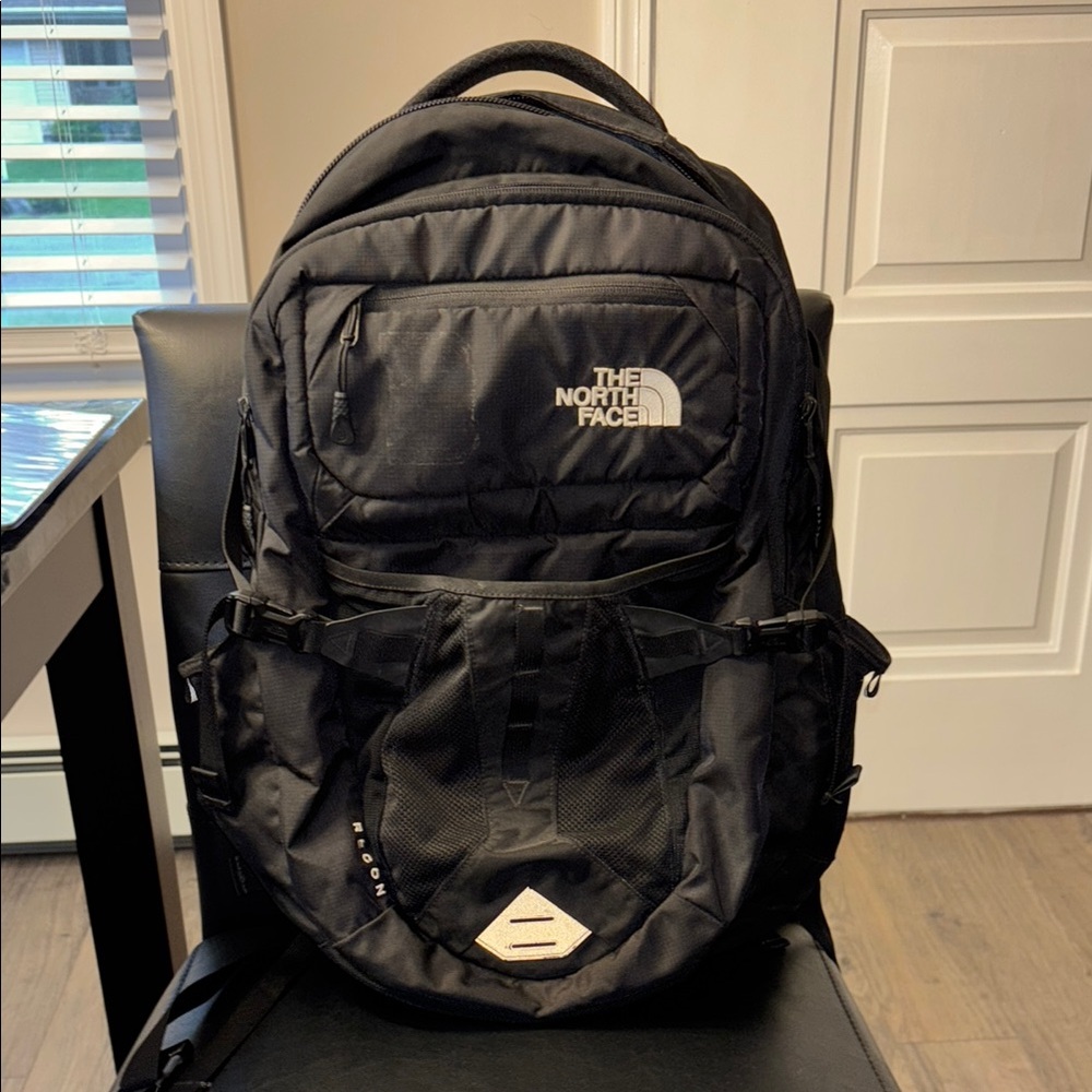 The North Face Black Backpack with Padded Straps and Durable Design